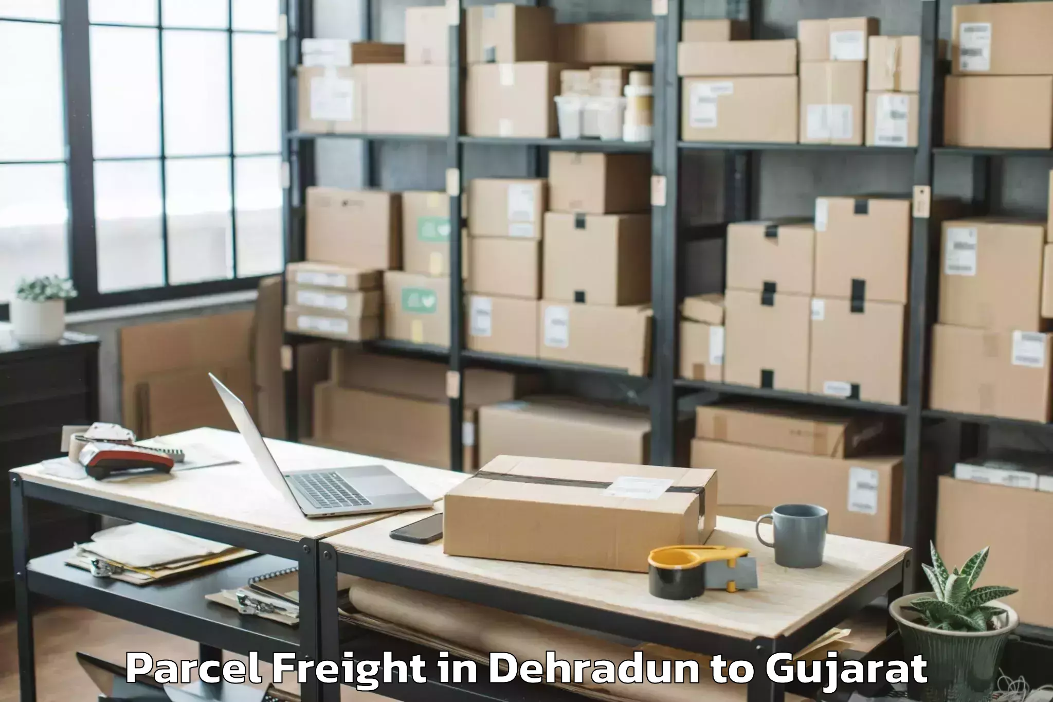 Discover Dehradun to Madhavkampa Parcel Freight